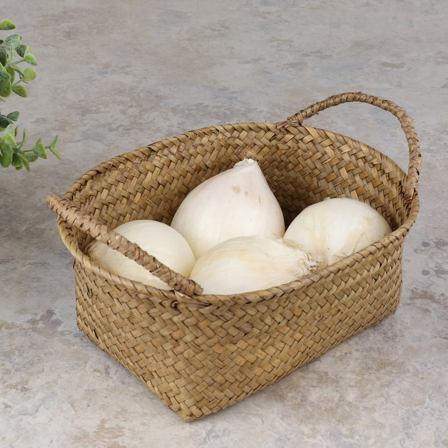 set of four oval wheat straw baskets by dibor