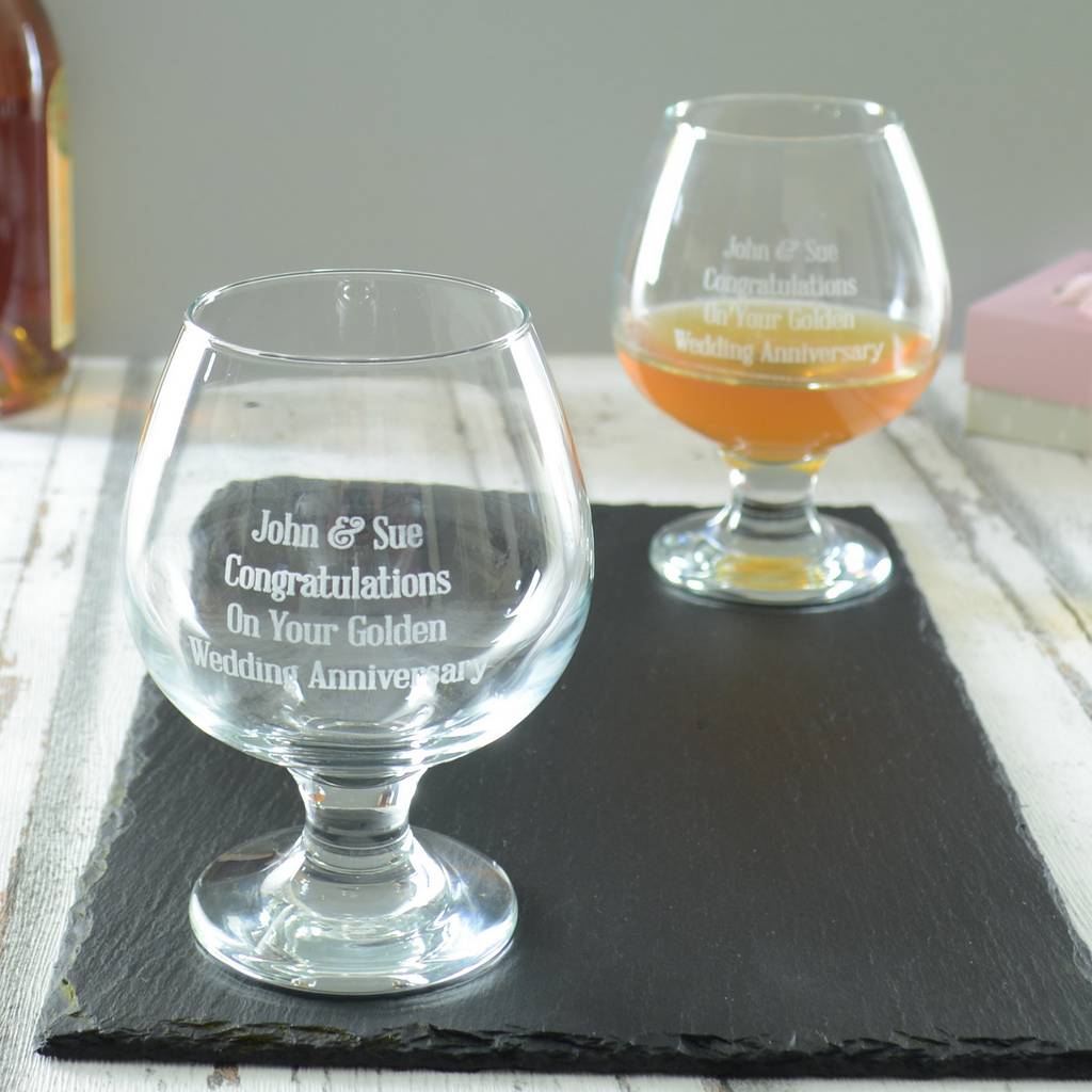 pair of wedding anniversary personalised brandy glasses by chalk and