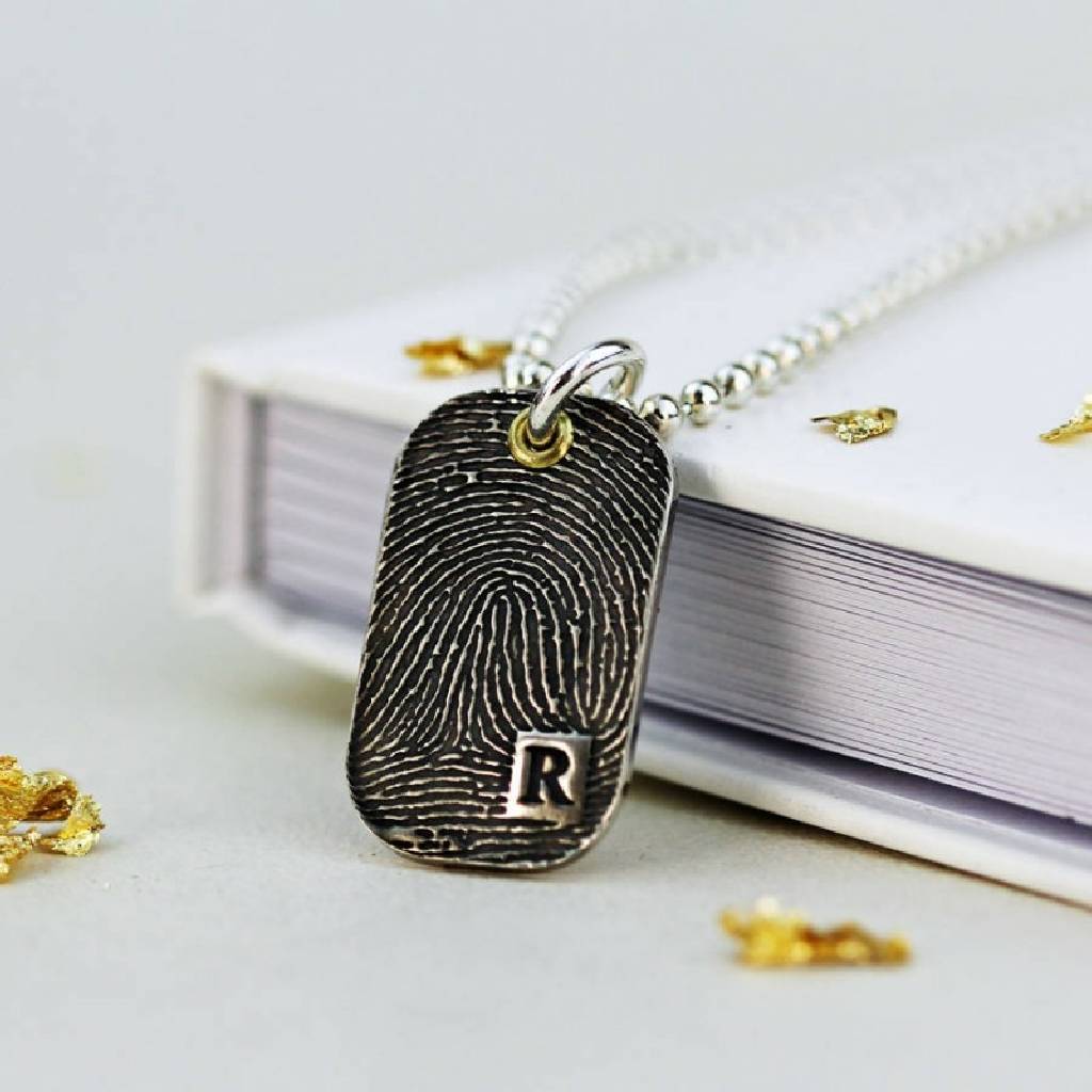inked fingerprint dog tag on a silver chain by & french
