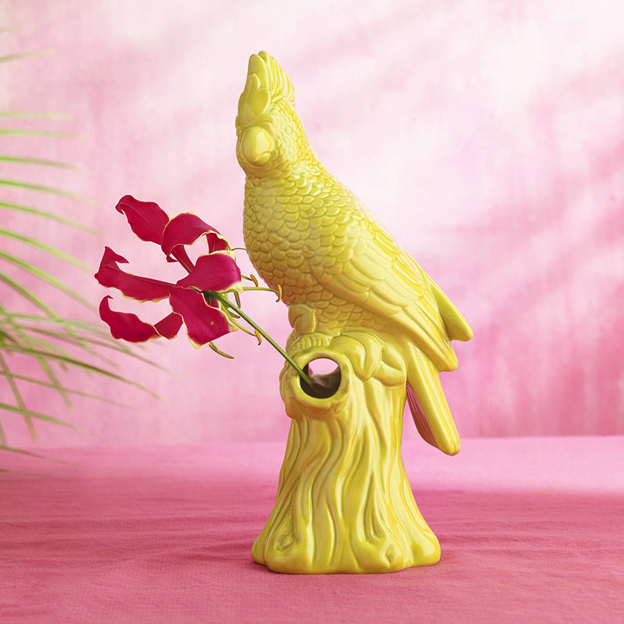 yellow parrot vase by the contemporary home