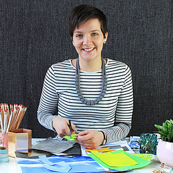 Fiona Clabon sat at her desk creating illustrations