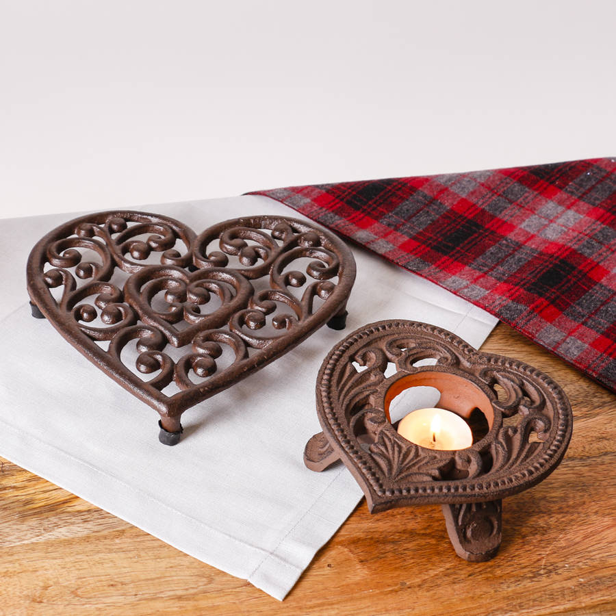 christmas cast iron trivet and candle holder set by dibor