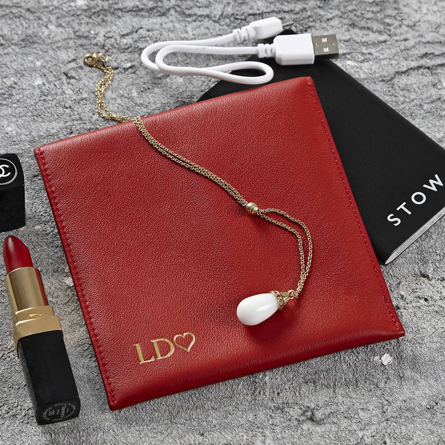 leather pouch with travel phone charger by stow