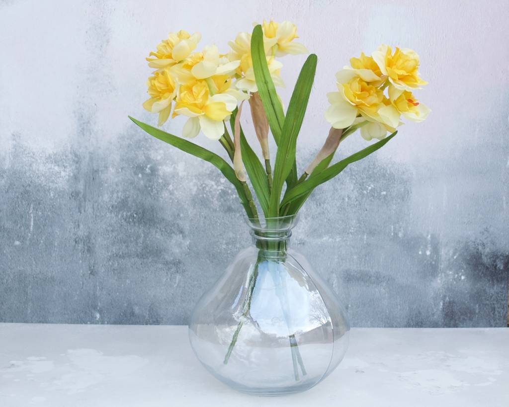 daffodils in bowl glass vase by abigail bryans designs