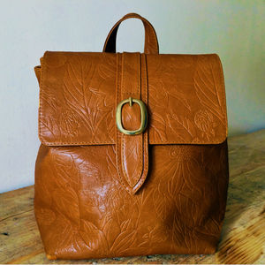 small tan leather backpack