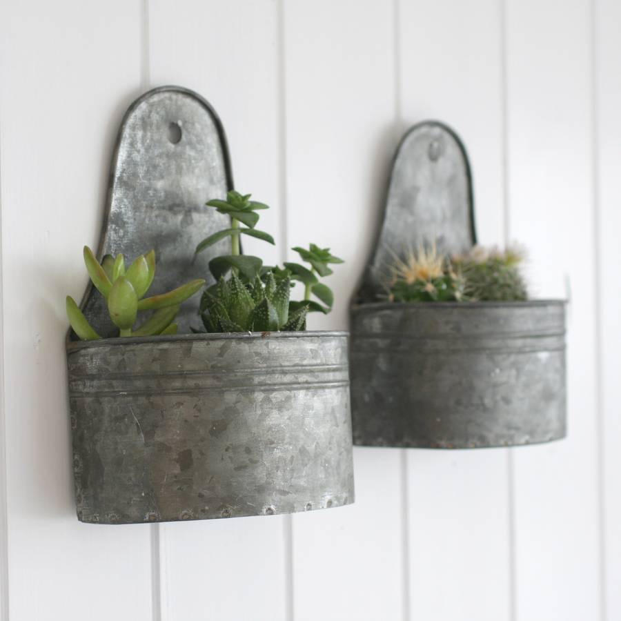 two mini zinc wall planters by magpie living