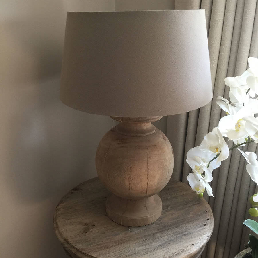 large wooden round table lamp and shade by cowshed interiors