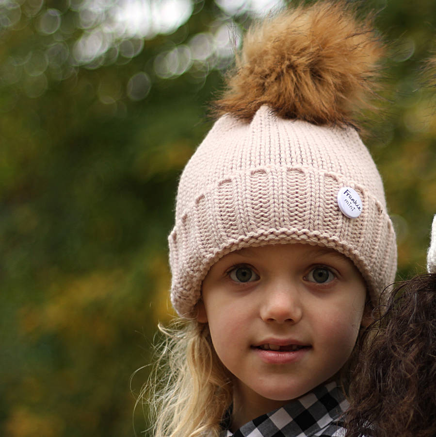 cream faux fur hat