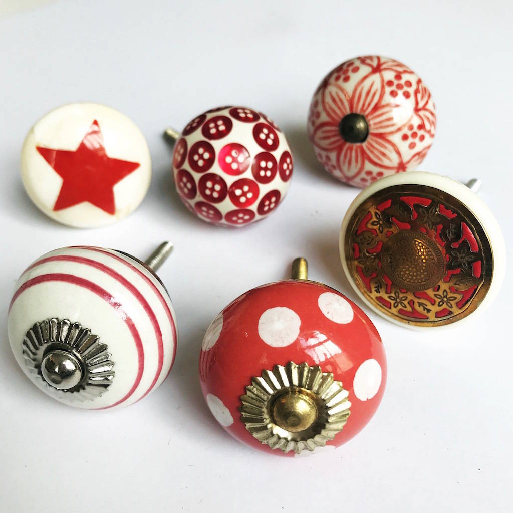 set of assorted red drawer knobs by french grey interiors