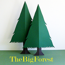 Two papercut trees and business name