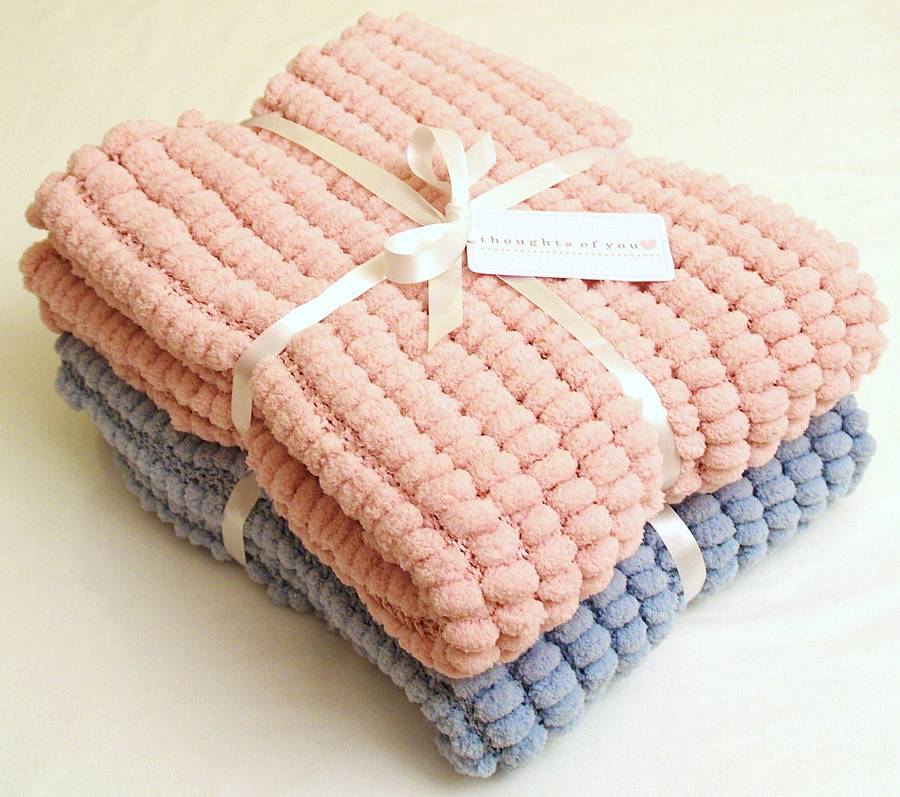 handmade knitted pom pom baby blanket by thoughts of you
