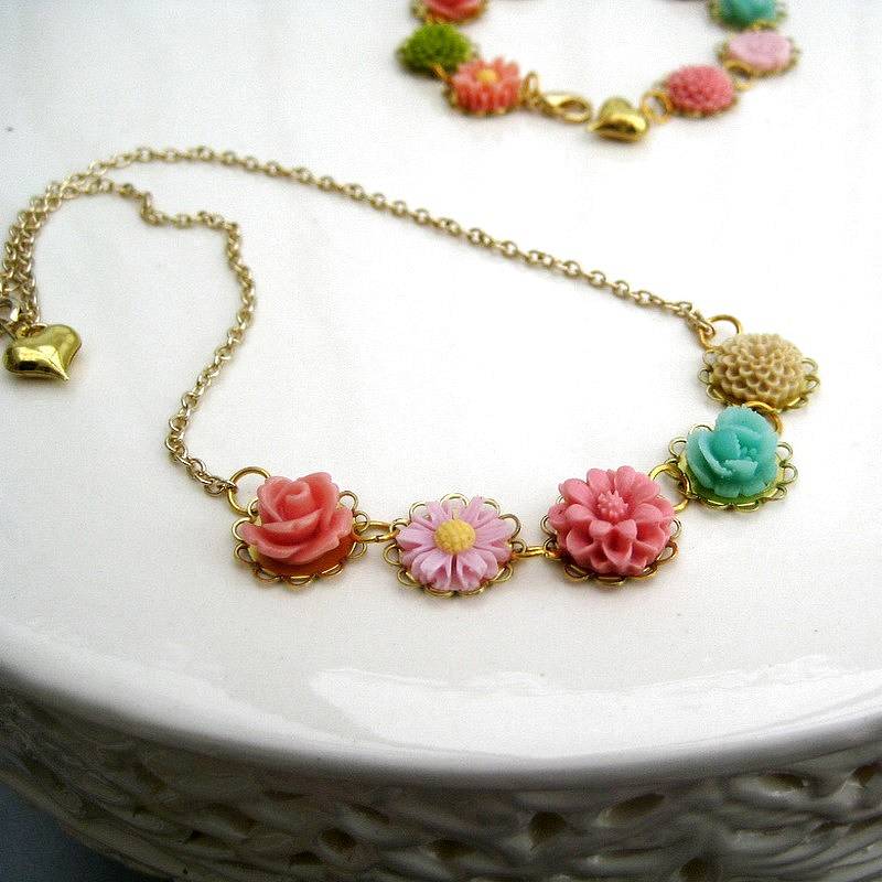 gold ring a roses flower necklace by evy designs