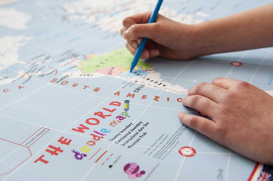 doodle world map with crayons by maps international