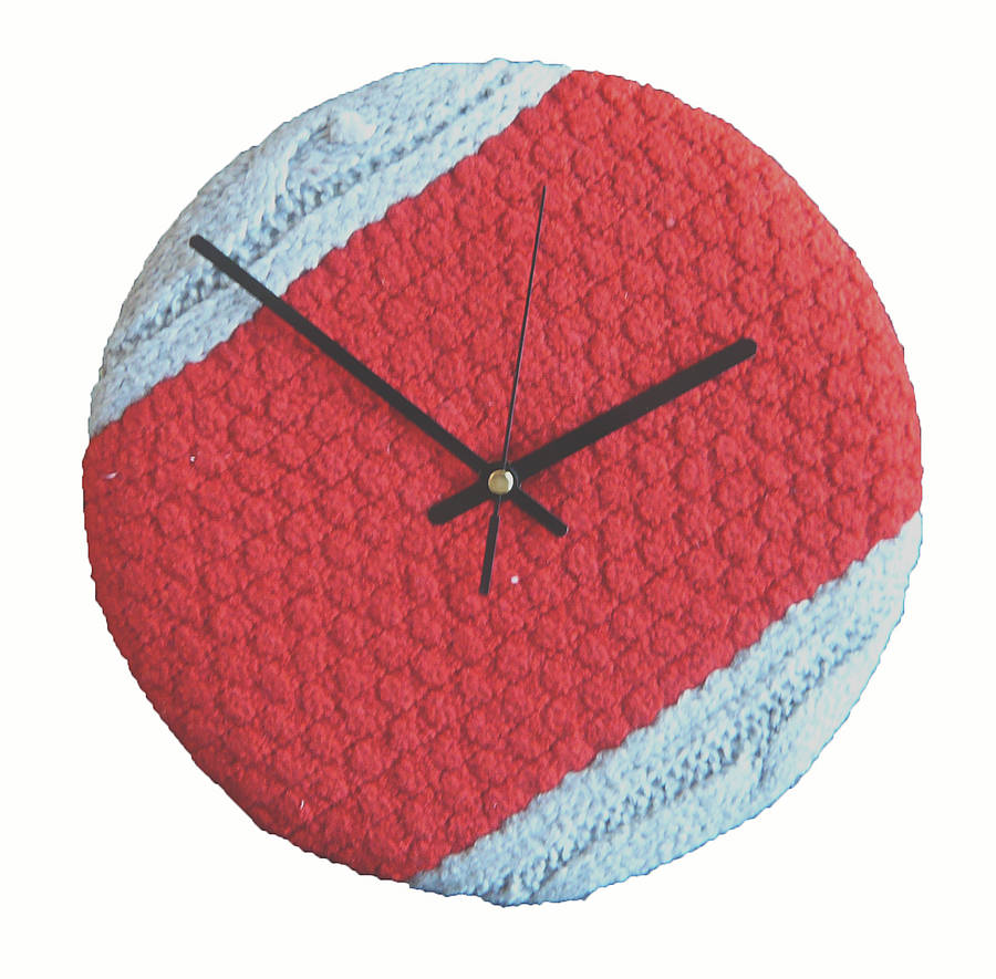 'finn' contrast knitted bobble clock by melanie porter