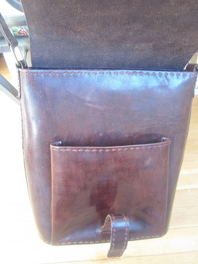 handmade leather messenger bag by the fairground
