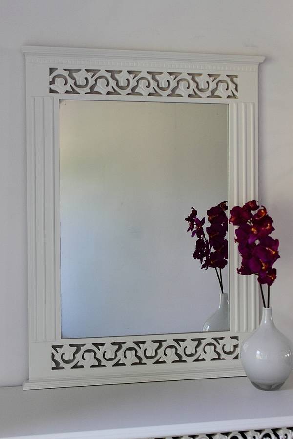 white wall mirror by out there interiors