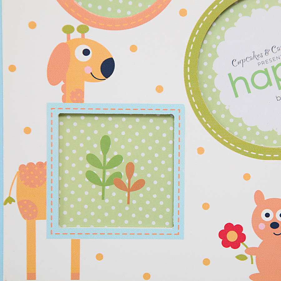 boy's hanging multi picture frame by red berry apple