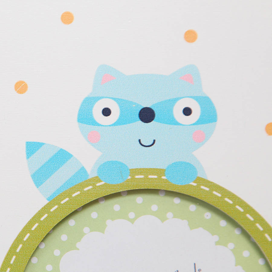 boy's hanging multi picture frame by red berry apple