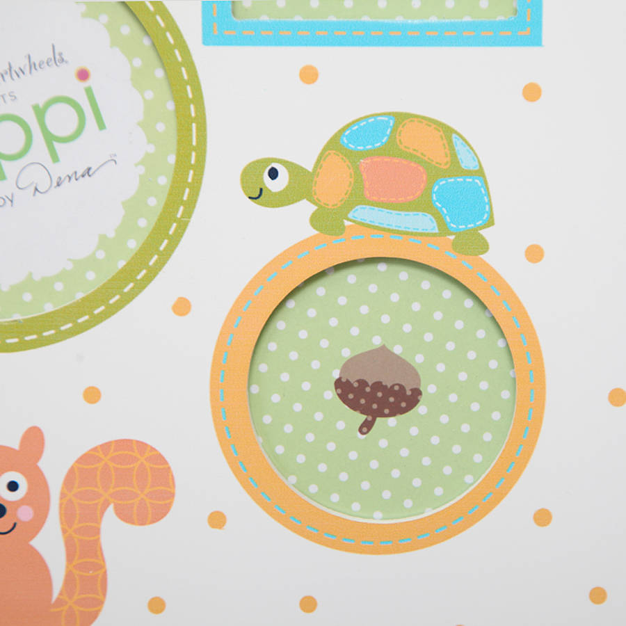 boy's hanging multi picture frame by red berry apple