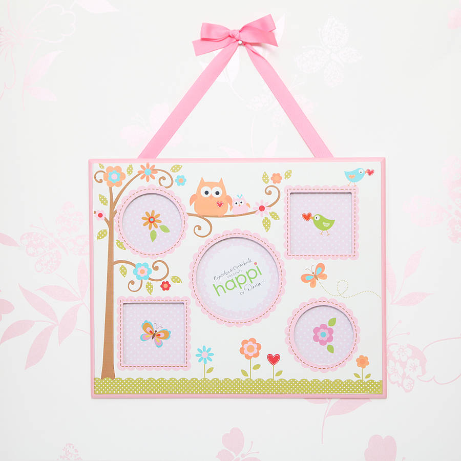 boy's hanging multi picture frame by red berry apple