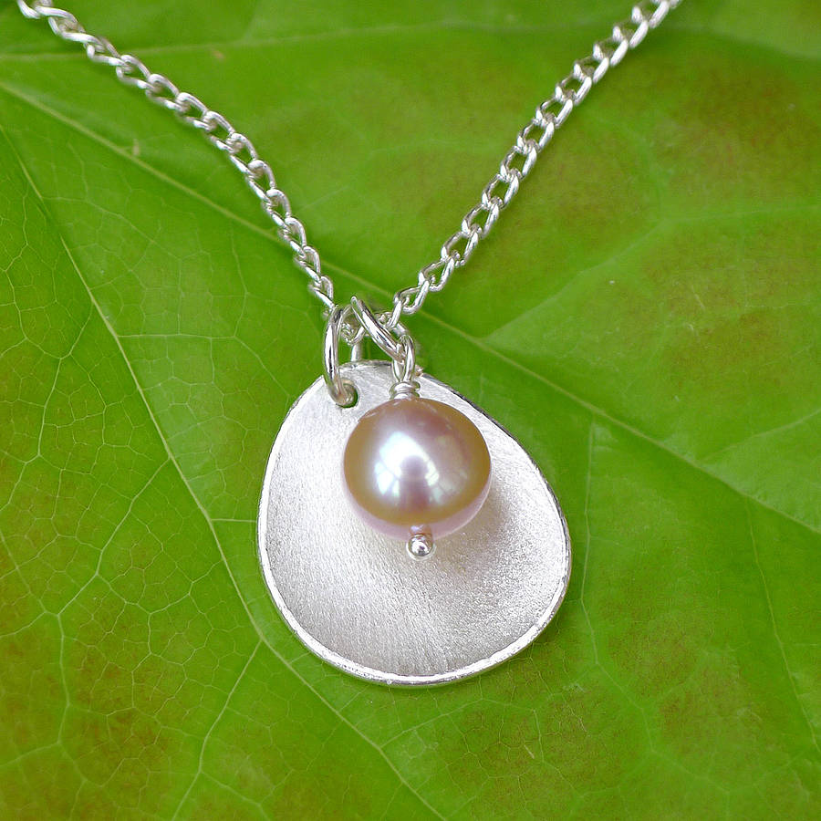 handmade pearl pendant with silver petal by lilia nash jewellery