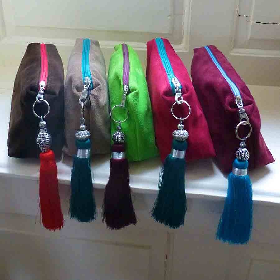 suede tassel clutch bag by lime tree design