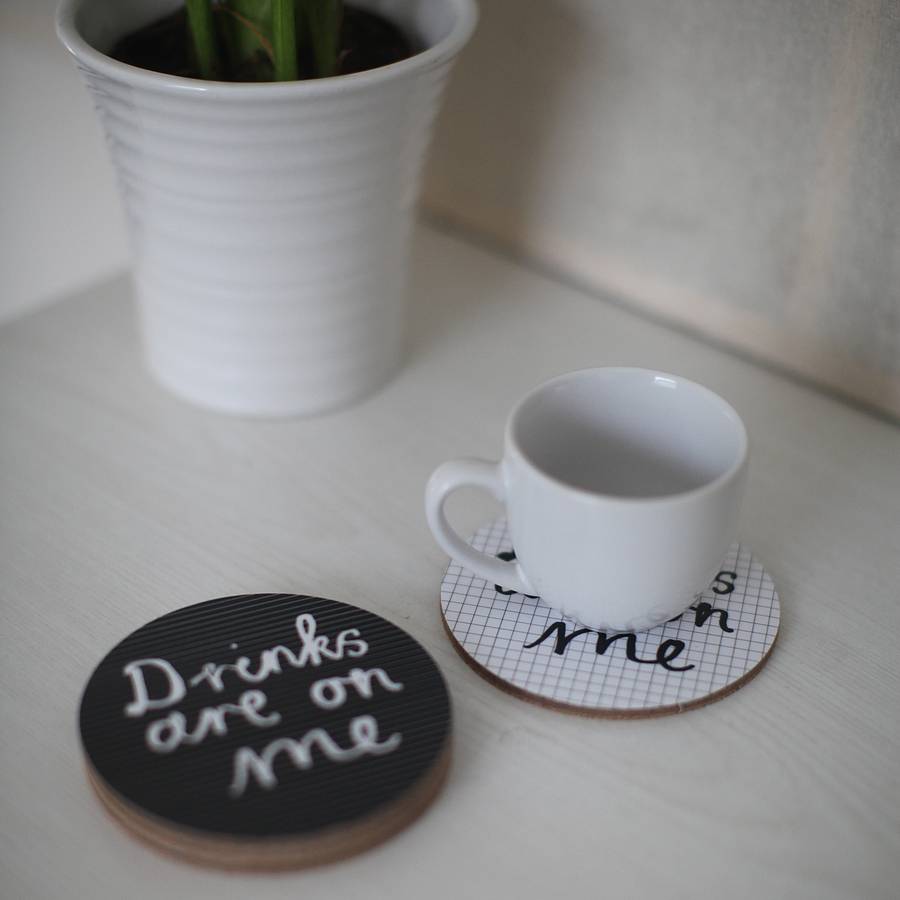 set of four 'drinks are on me' coasters by karin Åkesson design