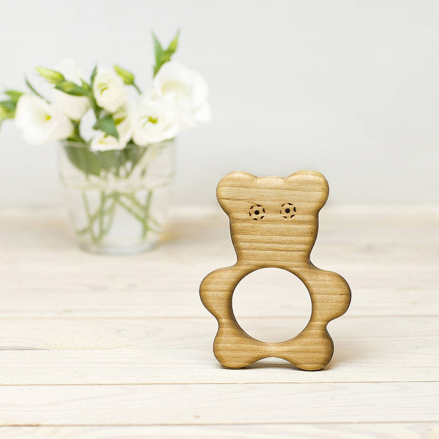 teddy bear with wooden face