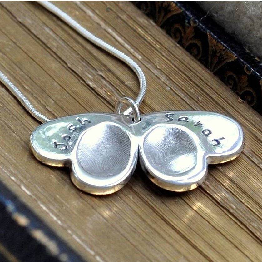 double fingerprint silver butterfly pendant by button and bean