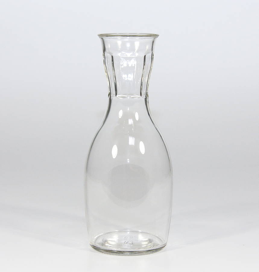 carafe and four glasses by home address