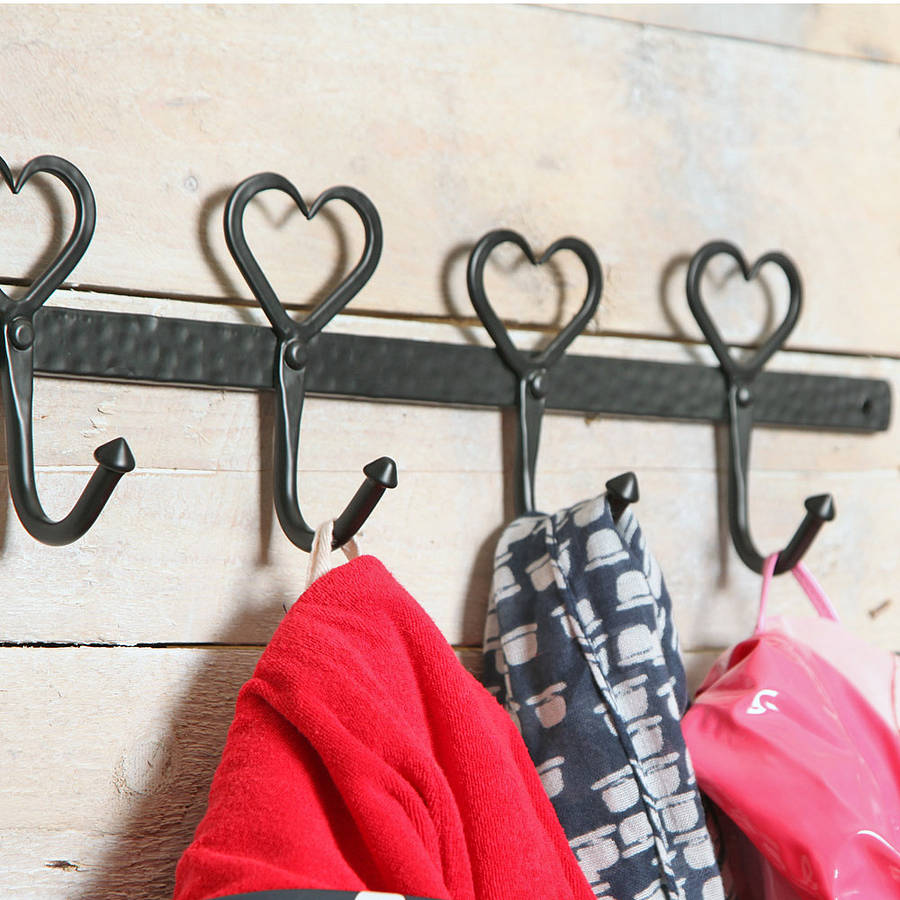 four heart peg wall hook by red berry apple