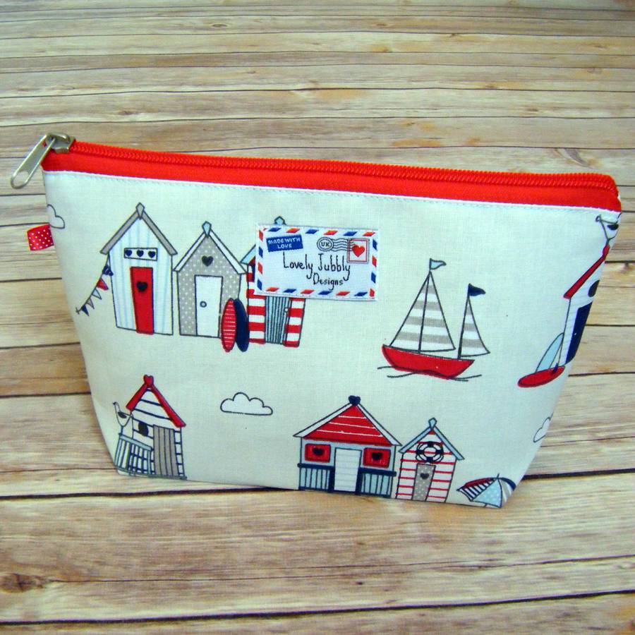 beach huts bunting nautical boat makeup wash bag by lovely jubbly