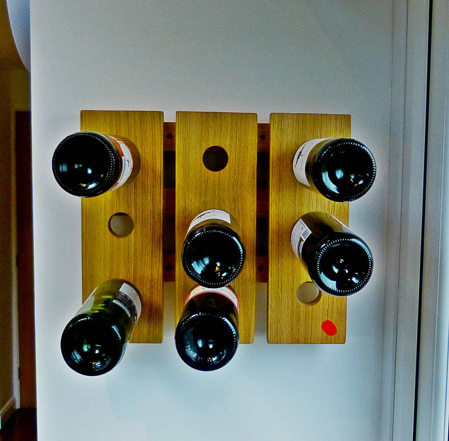 wine rack wall mounted handmade in solid oak by red thumb print