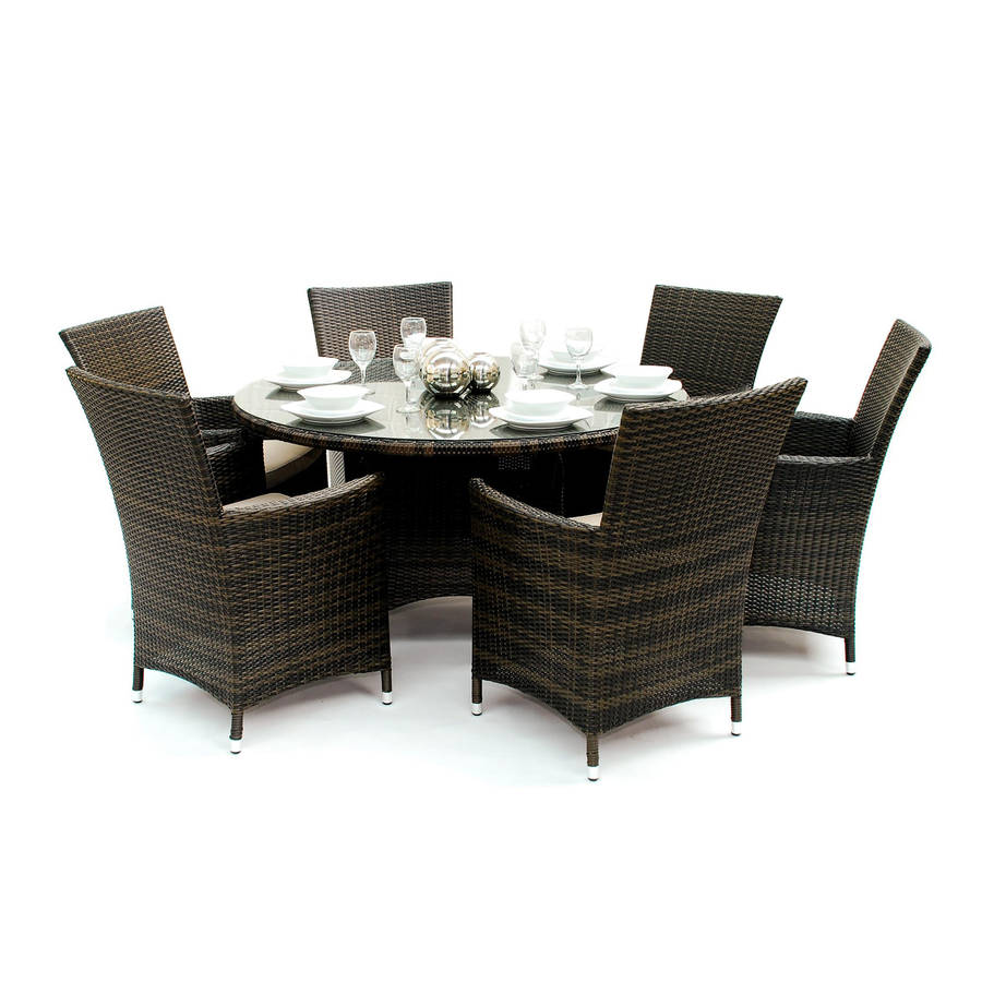 round rattan dining set by out there exteriors