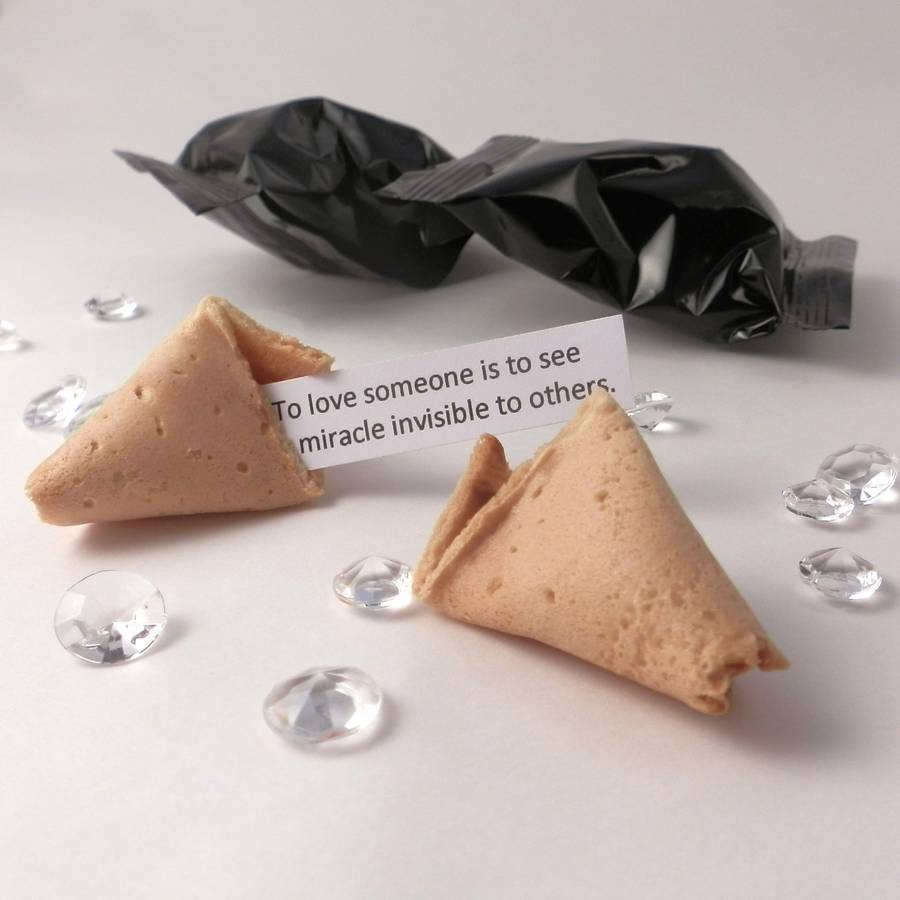 unusual wedding favours fortune cookies black wrapper by bunting & barrow