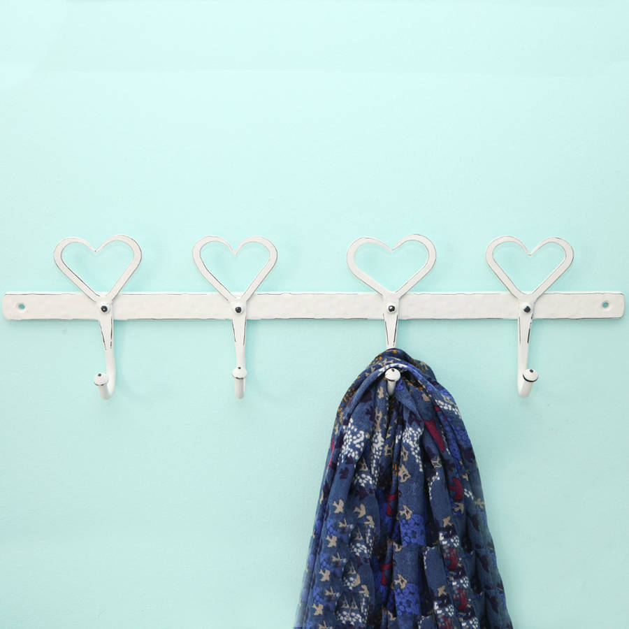 four heart peg wall hook by red berry apple