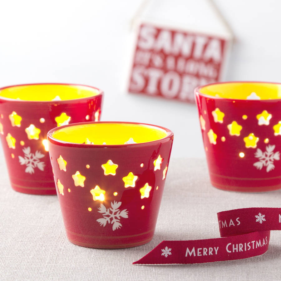 red ceramic christmas tea light holder by the christmas home