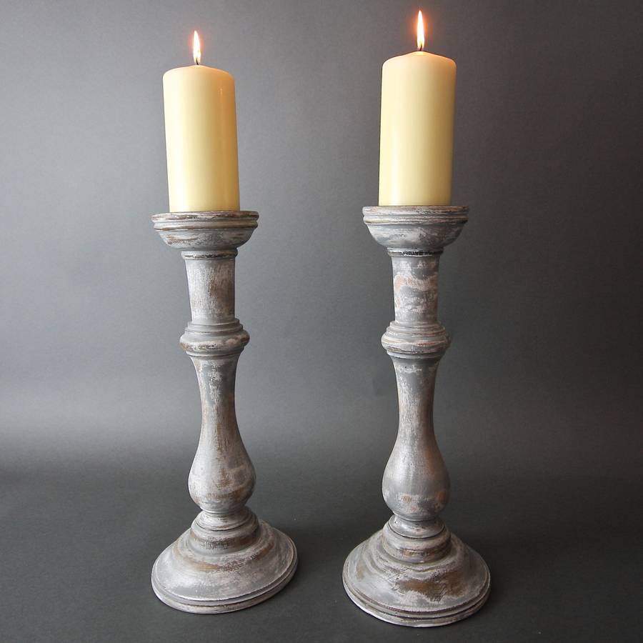 pair of wood candlesticks by london garden trading