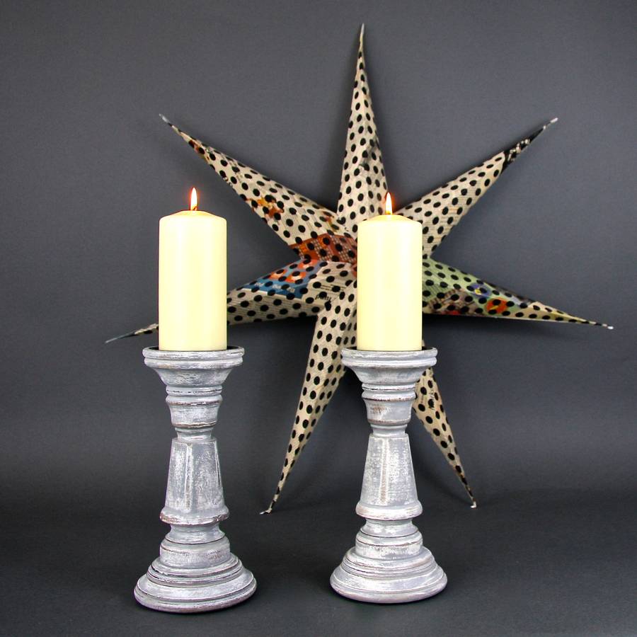 pair of wood candlesticks by london garden trading