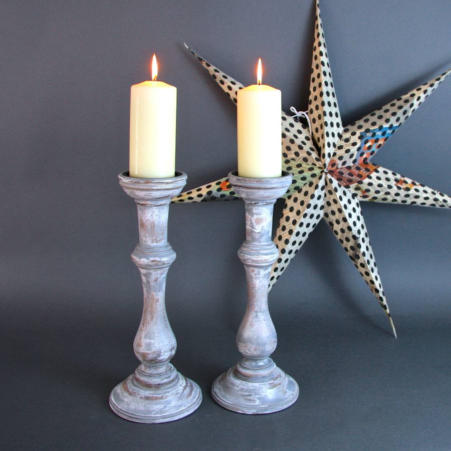 pair of wood candlesticks by london garden trading