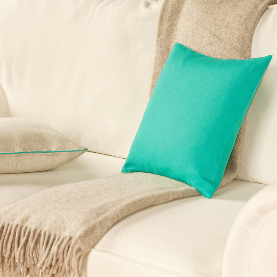 turquoise and oatmeal linen cushion cover by jodie byrne