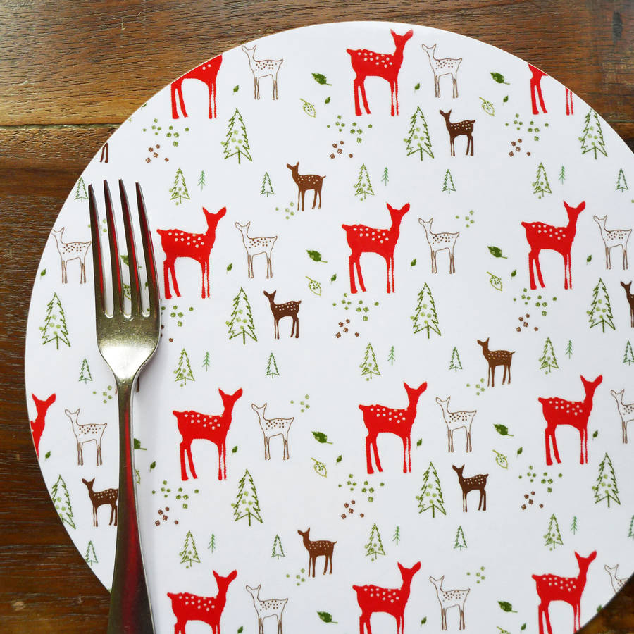 set of four christmas reindeer placemats by charlotte macey