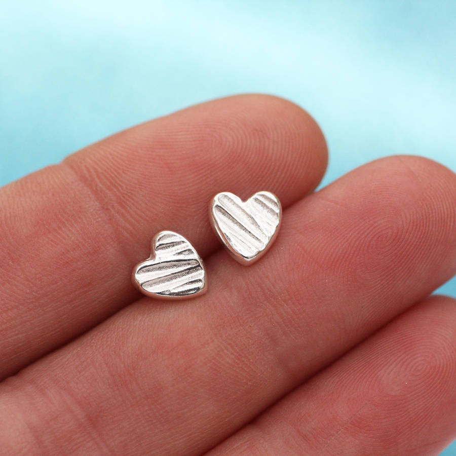 sculpted silver heart stud earrings by green river studio