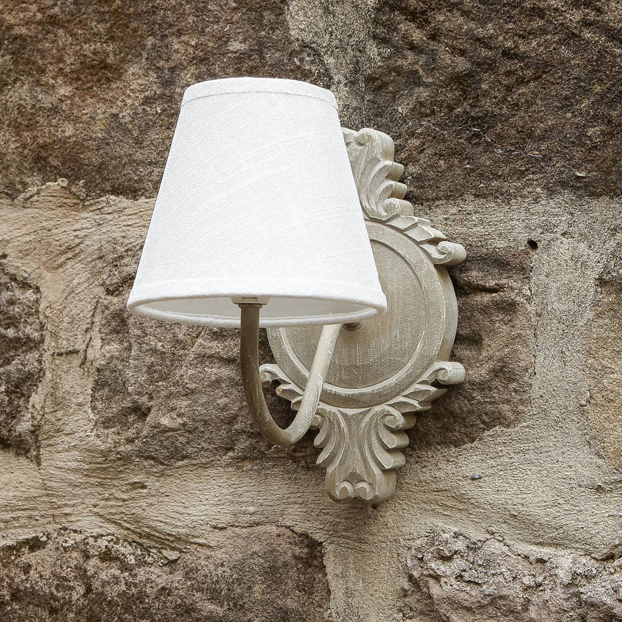 ornate distressed wall light by dibor