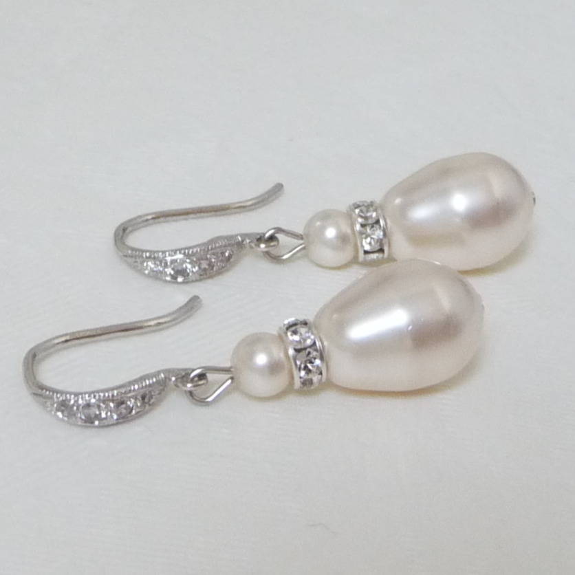 teardrop pearl and crystal fish hook earrings by katherine swaine