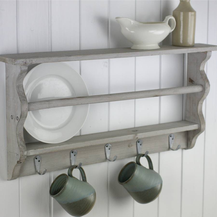 whitewashed wooden wall shelf with hooks by magpie living