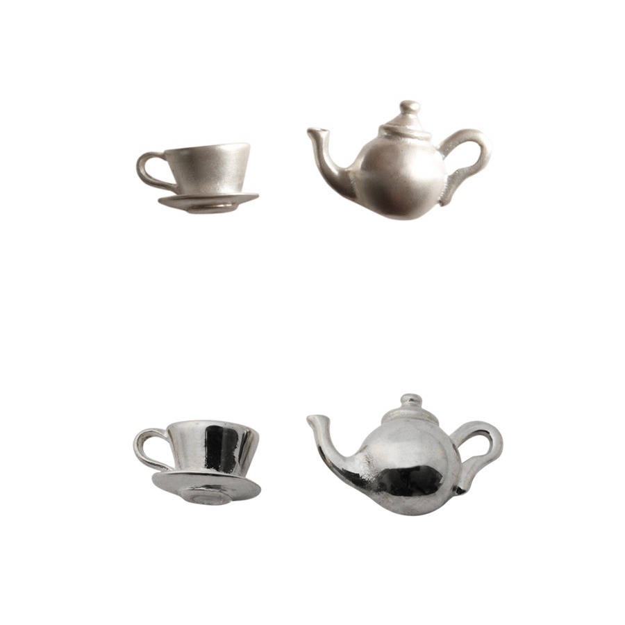 silver teapot jewellery set by lily charmed