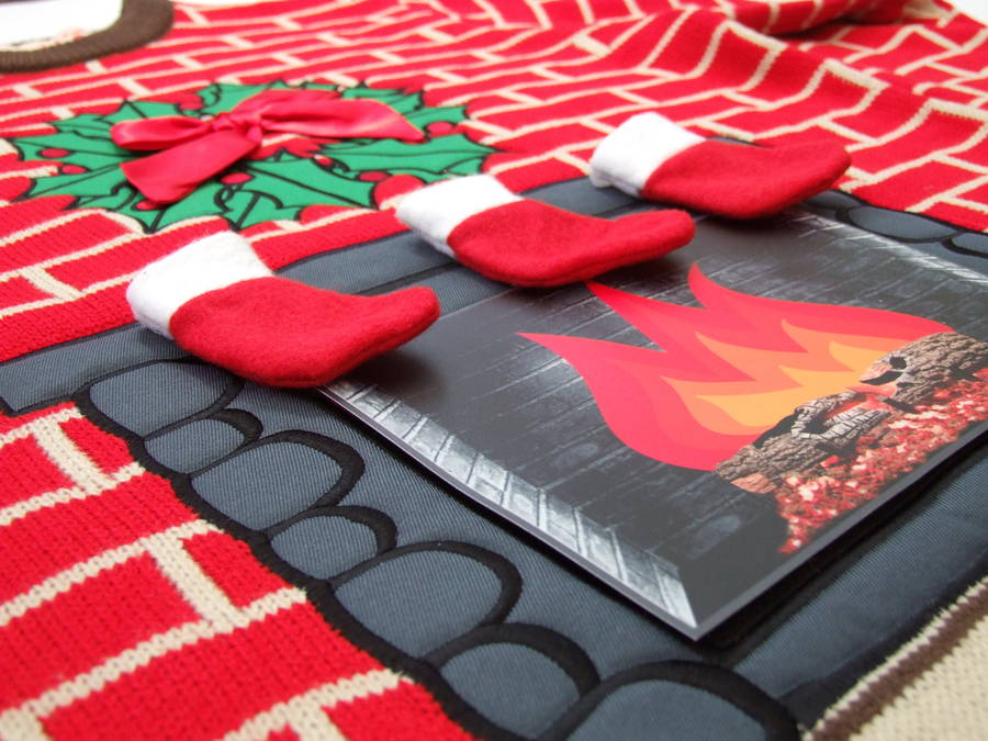 flashing fireplace lighted christmas jumper by cheesy christmas jumpers | notonthehighstreet.com