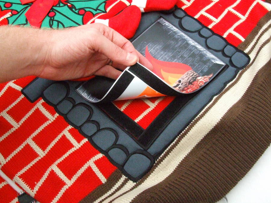 flashing fireplace lighted christmas jumper by cheesy christmas jumpers