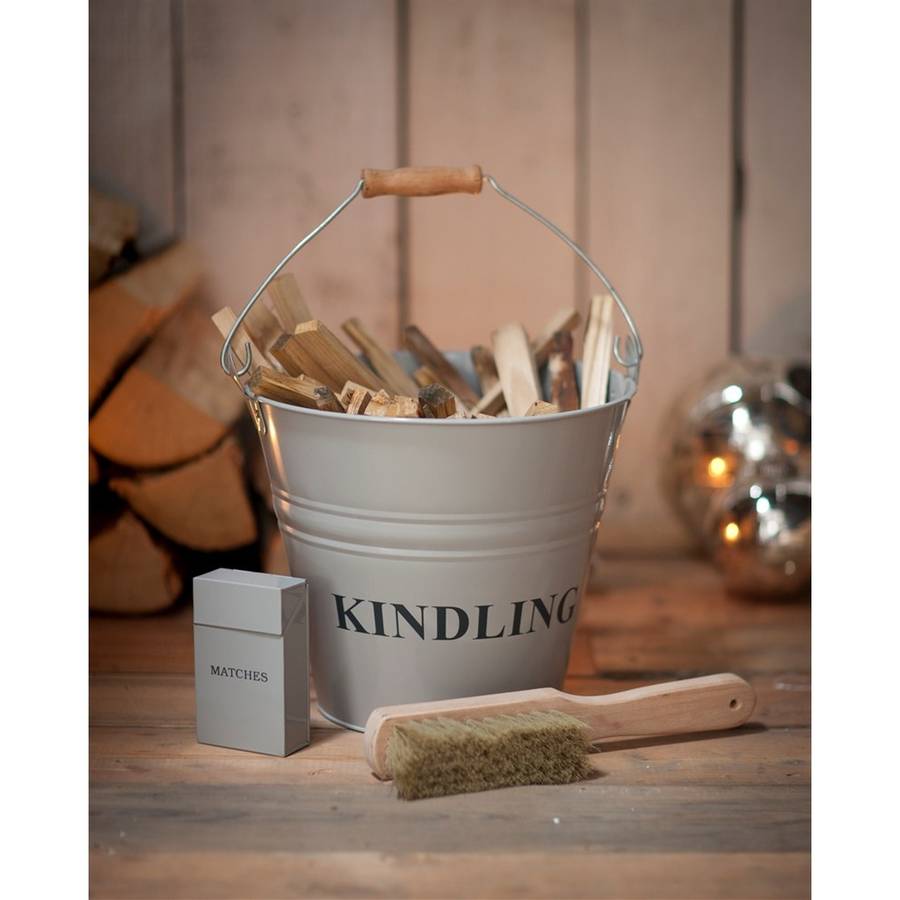 metal kindling wood bucket in clay by garden selections